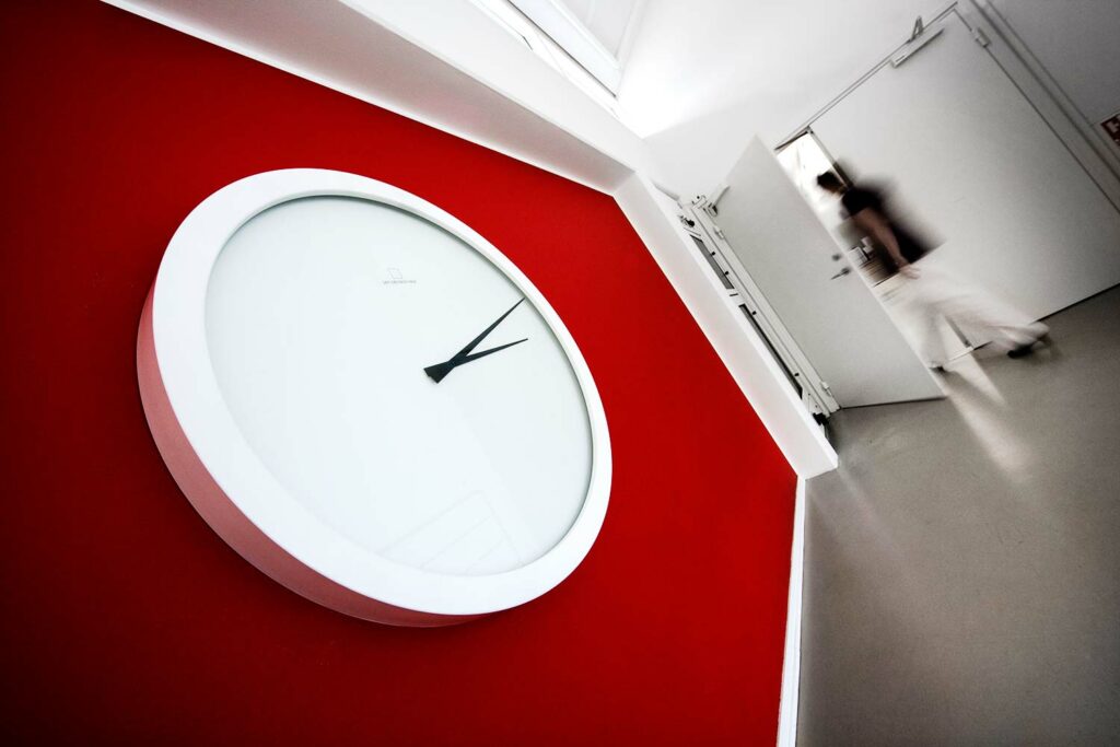 clock-on-red-wall